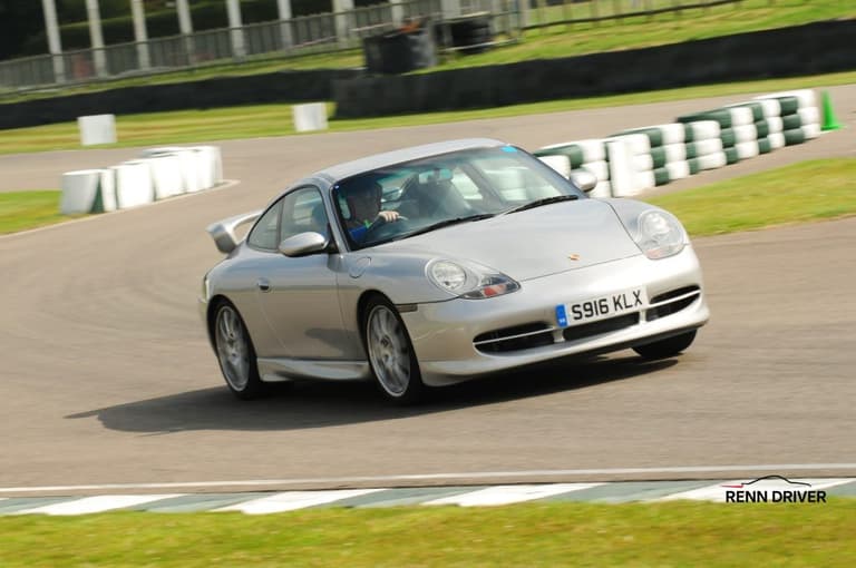 Silver Porsche 996 on the track