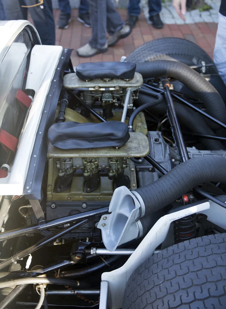 Air-cooled flat-six in the rear of a 1966 Porsche 906 race car.