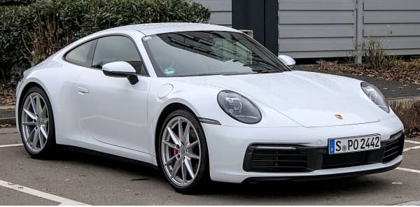Porsche 911 vs Ferrari — Which Sports Car Should You Buy?