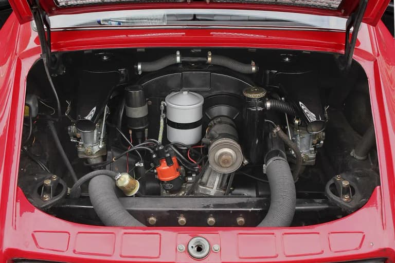 Air-cooled flat-four engine bay of a Porsche 912 with Solex carburetors