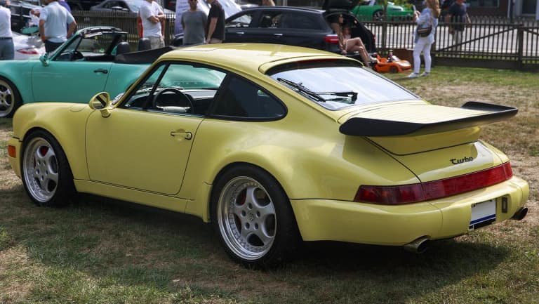 1991 Porsche 964 Turbo in Summer Yellow, rear view.