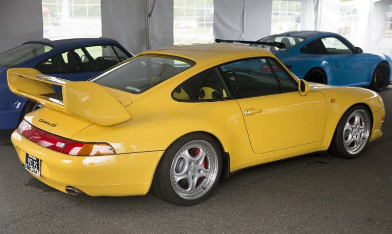 1995 Porsche 993 Carrera RS in Speed Yellow, rear view.