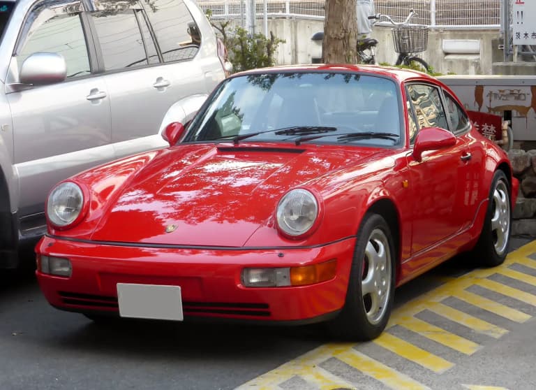 Red Porsche 964 Carrera 2 coupe, front view