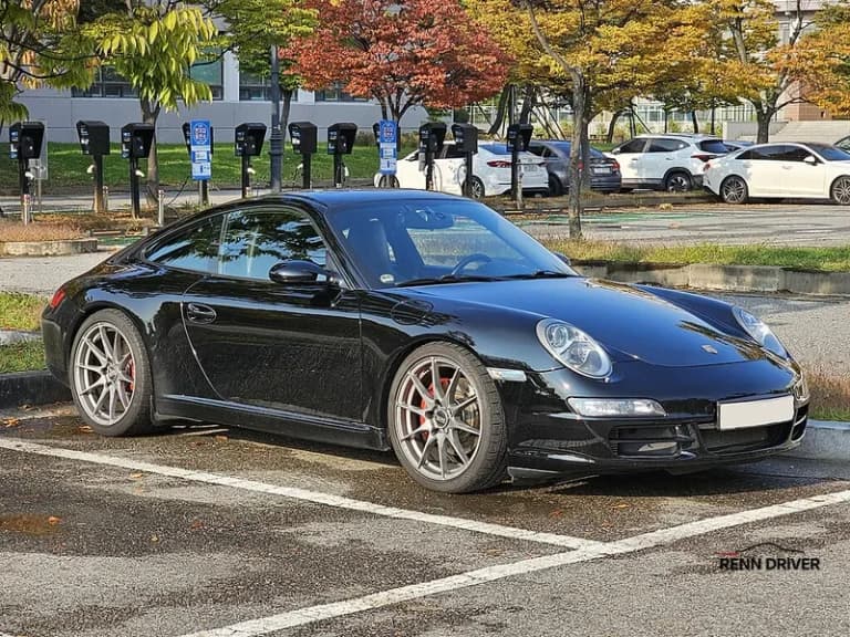 Black Porsche 997.1 front three quarter view