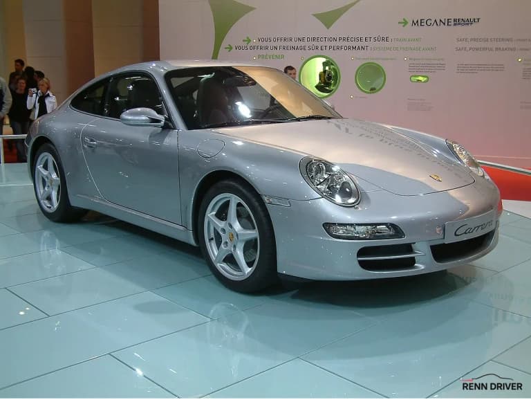 Porsche 911 997 Carrera in silver at an auto show