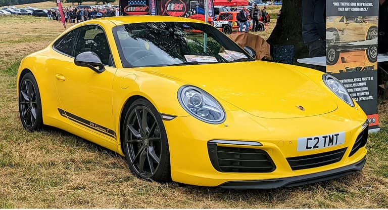 Racing Yellow Porsche 991.2 Carrera T front three-quarter view
