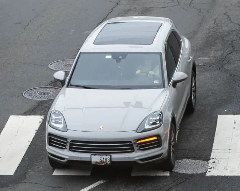 White Porsche Cayenne seen from above, front view
