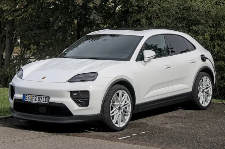 White Porsche Macan electric SUV, front three-quarter view
