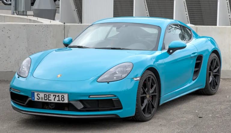 Blue Porsche 718 Cayman GTS coupe, the coupe in the cayman vs boxster comparison