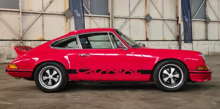 Guards Red Porsche 911 Carrera, the most iconic of all Porsche 911 colors, side view