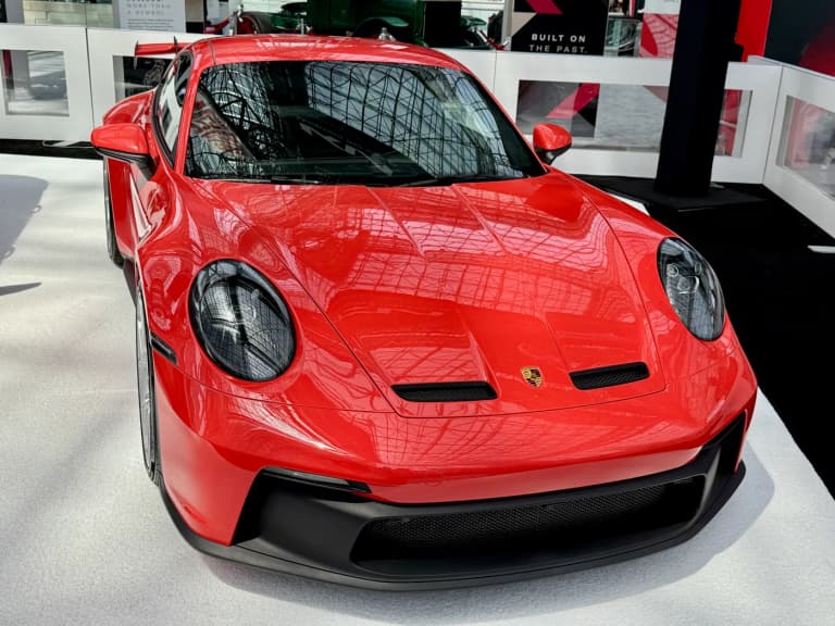 Red Porsche 911 (992) GT3 with rear wing