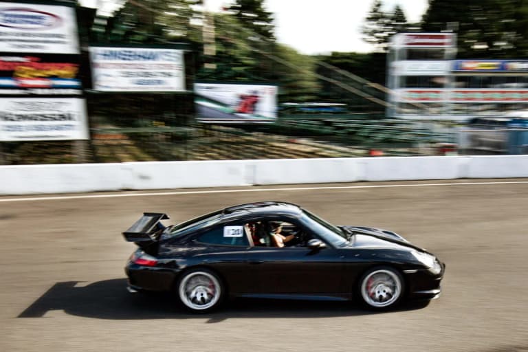 Black Porsche 996 GT3 on track