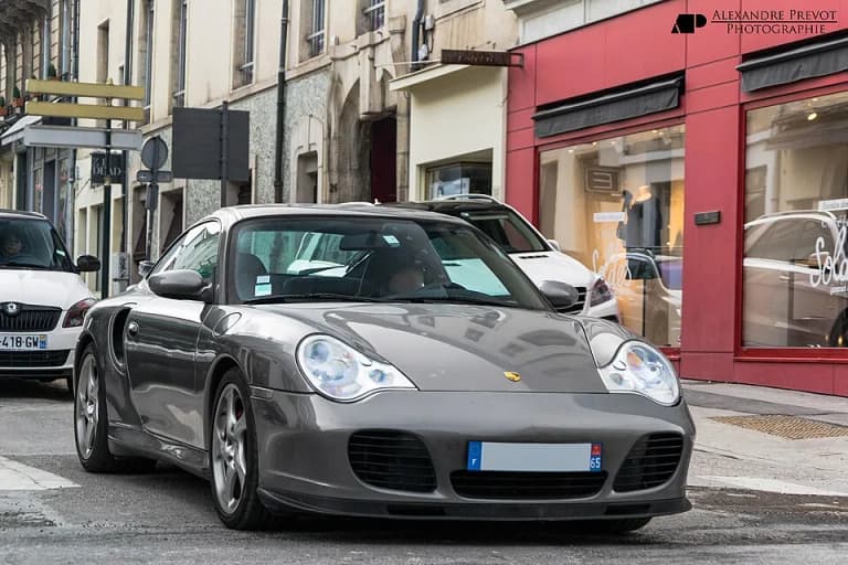 Silver Porsche 911 Turbo at a car show
