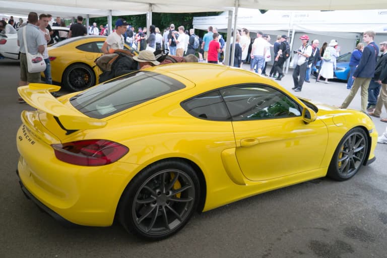 Yellow Porsche 718 Cayman GT4 sports car