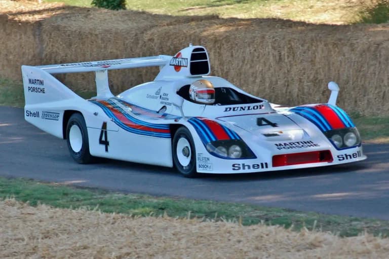 Martini liveried Porsche 936 climbing the Goodwood hillclimb