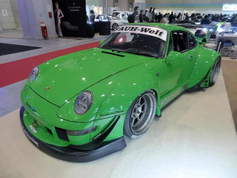 Green RWB Porsche 993 named Rough Rhythm with wide arches and silver wheels