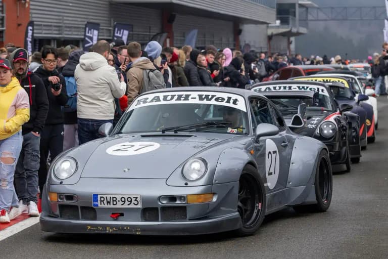 Gray RWB Porsche 993 race car number 27 in a track pit lane lineup
