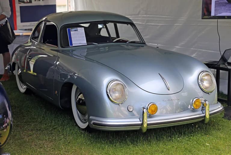 Silver-blue early Porsche 356 coupe on display