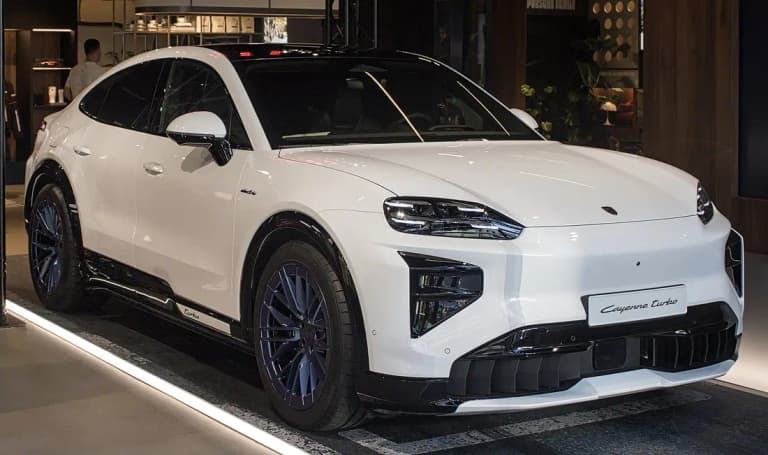 White Porsche Cayenne Turbo Coupé Electric front three-quarter view