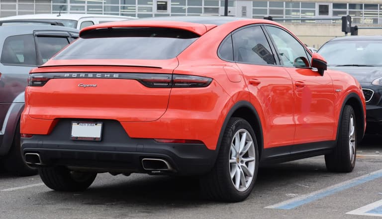 Porsche Cayenne E-Hybrid Coupe, rear three-quarter view showing the sloping fastback roofline