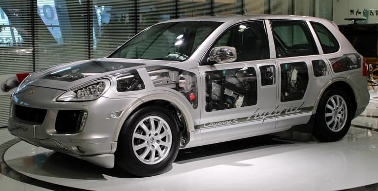 Silver Porsche Cayenne S Hybrid concept cutaway showing the hybrid drivetrain components
