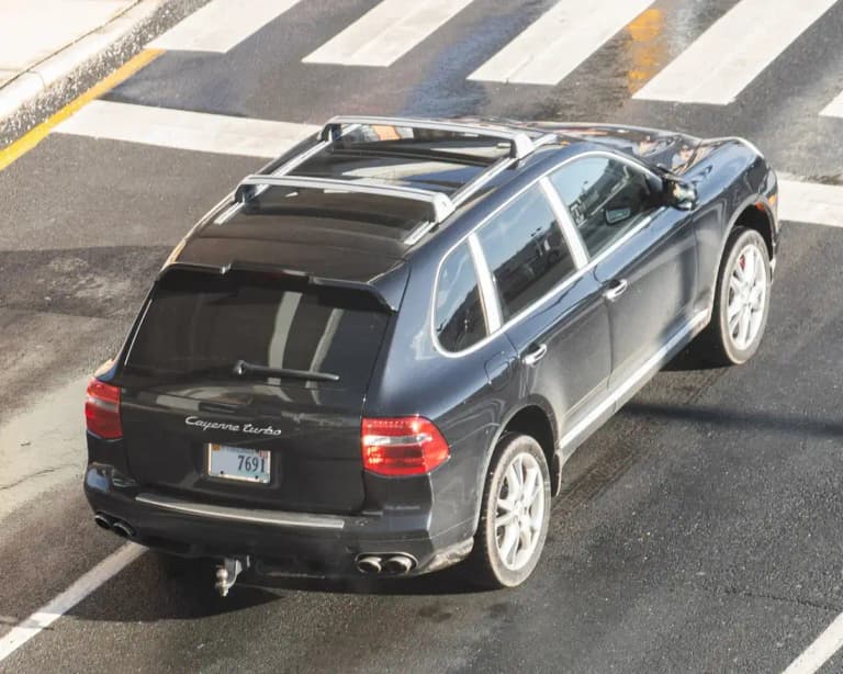 Black Porsche Cayenne Turbo (957), elevated rear three-quarter view