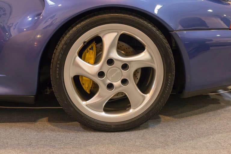 Porsche 993 Turbo S wheel with yellow brake caliper