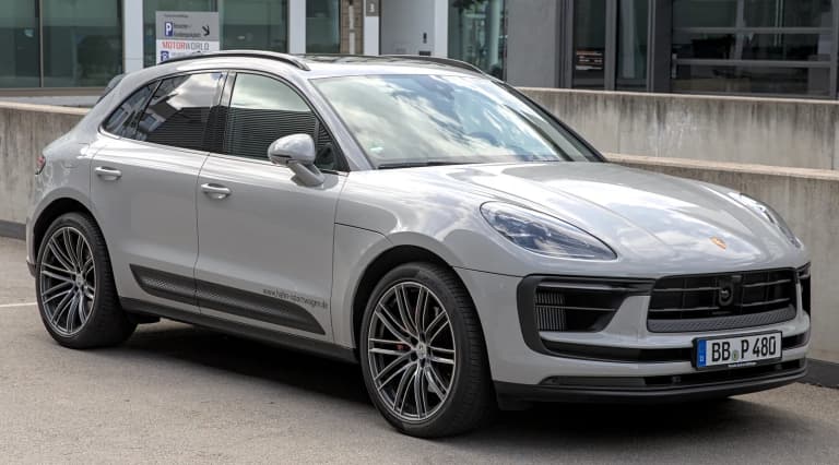 Silver 2022 Porsche Macan S viewed from the front three-quarter angle.