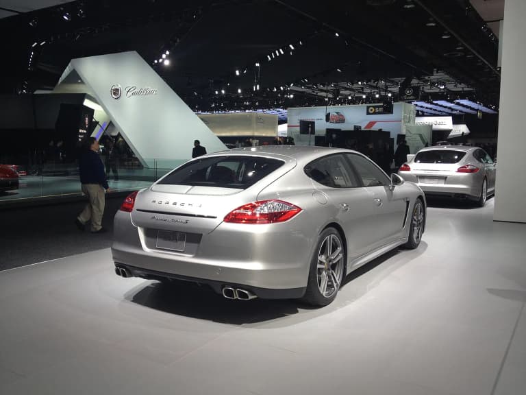 Silver first-generation Porsche Panamera Turbo S displayed at the 2013 Detroit auto show.