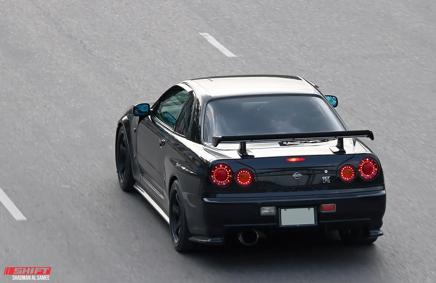 JDM Nissan Skyline GT-R R34 representing the scene