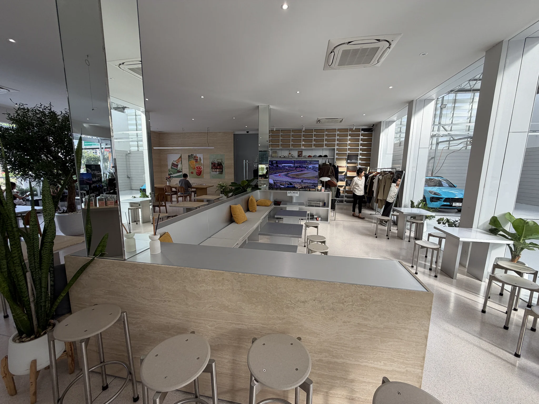Archive Coffee interior with cars in view