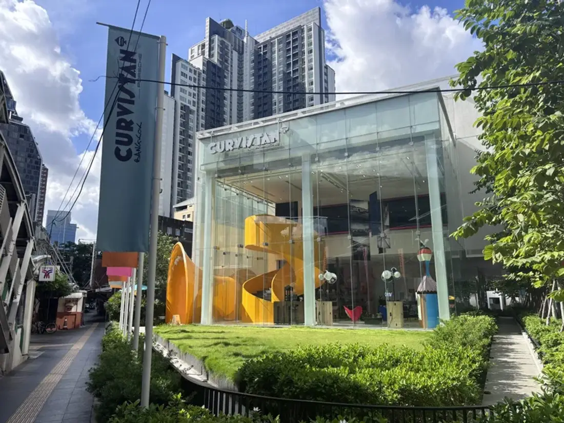 Curvistan Bangkok glass fronted venue on Sukhumvit 38 with the orange spiral staircase inside